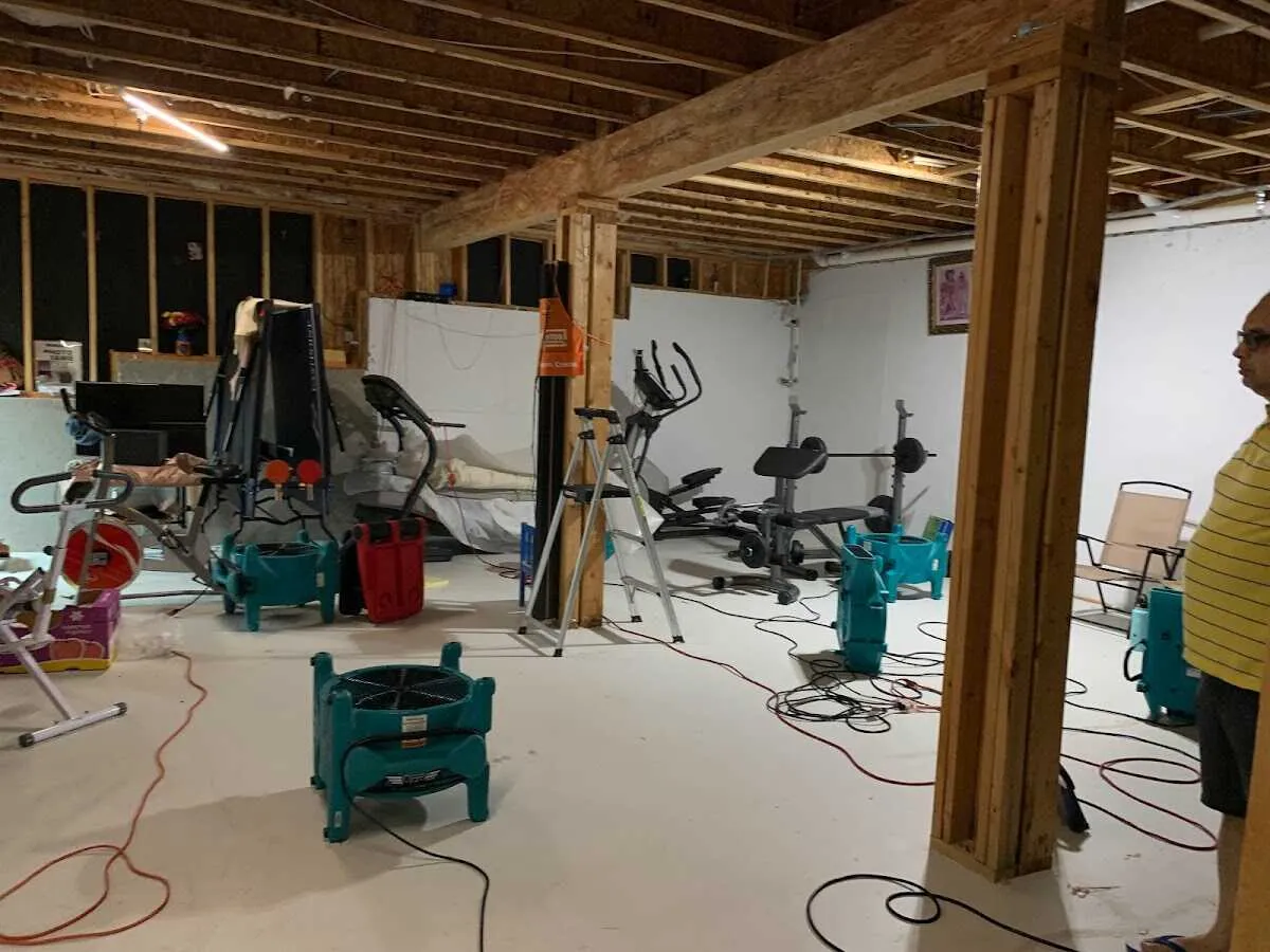 Basement drying equipment setup for Contents Cleaning & Restoration in East Grand Rapids